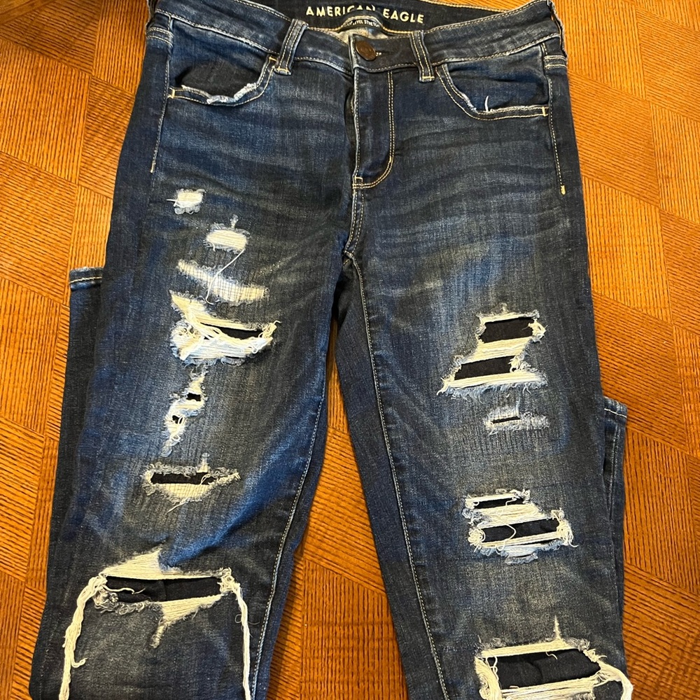 American Eagle size 4 distressed denim jeans.